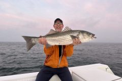 Striped-Bass-Fishing-Charters-Sunset-scaled